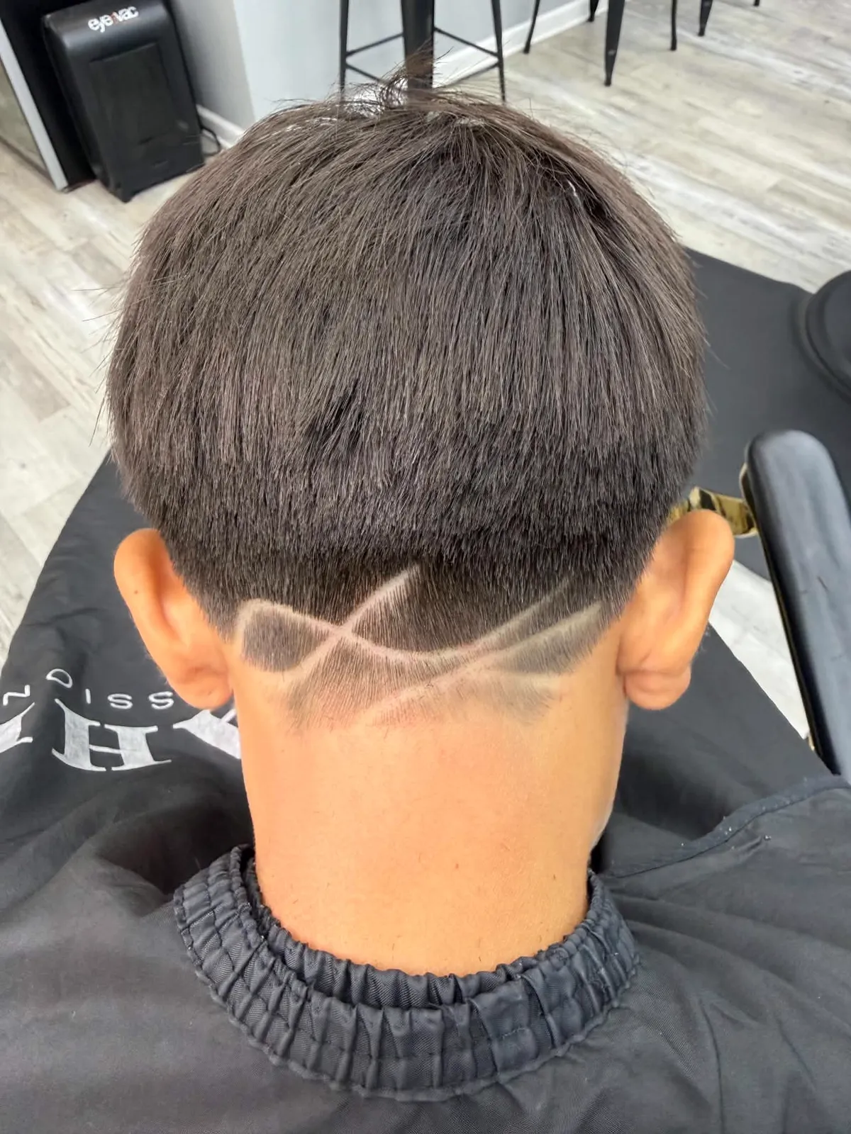 Clean neckline design haircut at NV Hair Studio